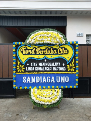 Papan Bunga Duka di Madidir